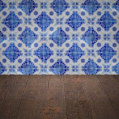 Image showing Wood table top and blur vintage ceramic tile pattern wall