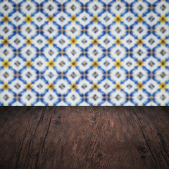 Image showing Wood table top and blur vintage ceramic tile pattern wall