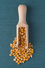 Image showing Wooden scoop with corn