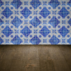 Image showing Wood table top and blur vintage ceramic tile pattern wall