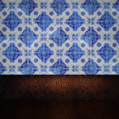 Image showing Wood table top and blur vintage ceramic tile pattern wall