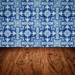 Image showing Wood table top and blur vintage ceramic tile pattern wall