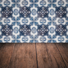 Image showing Wood table top and blur vintage ceramic tile pattern wall