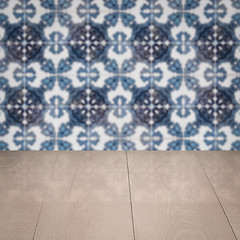 Image showing Wood table top and blur vintage ceramic tile pattern wall