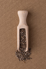 Image showing Wooden scoop with chia seeds