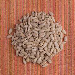 Image showing Circle of shelled sunflower seeds