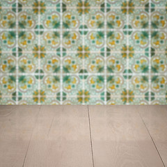 Image showing Wood table top and blur vintage ceramic tile pattern wall