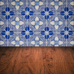 Image showing Wood table top and blur vintage ceramic tile pattern wall