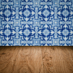 Image showing Wood table top and blur vintage ceramic tile pattern wall