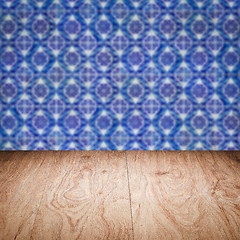 Image showing Wood table top and blur vintage ceramic tile pattern wall