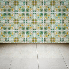 Image showing Wood table top and blur vintage ceramic tile pattern wall