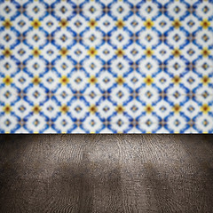 Image showing Wood table top and blur vintage ceramic tile pattern wall