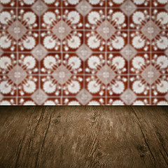 Image showing Wood table top and blur vintage ceramic tile pattern wall