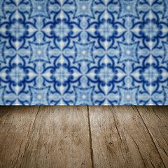 Image showing Wood table top and blur vintage ceramic tile pattern wall