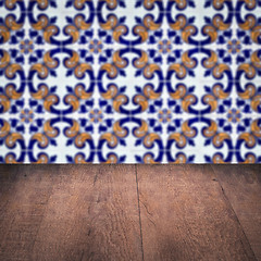 Image showing Wood table top and blur vintage ceramic tile pattern wall