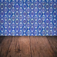 Image showing Wood table top and blur vintage ceramic tile pattern wall