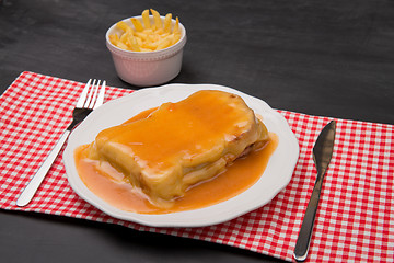 Image showing Francesinha and french fries