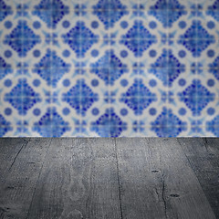 Image showing Wood table top and blur vintage ceramic tile pattern wall