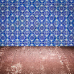 Image showing Wood table top and blur vintage ceramic tile pattern wall