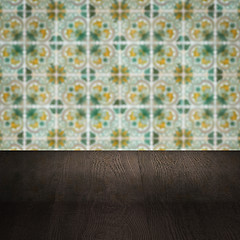 Image showing Wood table top and blur vintage ceramic tile pattern wall