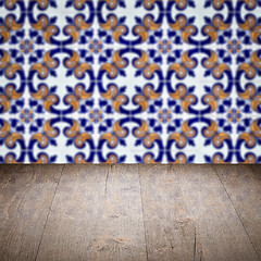 Image showing Wood table top and blur vintage ceramic tile pattern wall