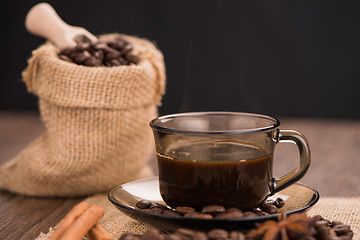 Image showing Coffee cup with burlap sack