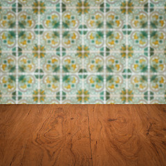 Image showing Wood table top and blur vintage ceramic tile pattern wall