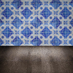 Image showing Wood table top and blur vintage ceramic tile pattern wall