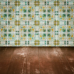 Image showing Wood table top and blur vintage ceramic tile pattern wall