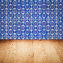 Image showing Wood table top and blur vintage ceramic tile pattern wall