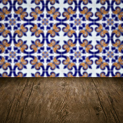 Image showing Wood table top and blur vintage ceramic tile pattern wall