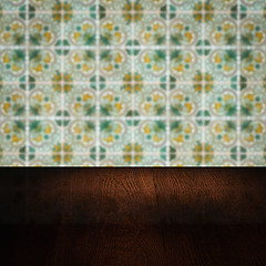 Image showing Wood table top and blur vintage ceramic tile pattern wall