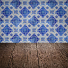 Image showing Wood table top and blur vintage ceramic tile pattern wall