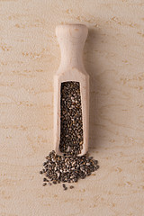 Image showing Wooden scoop with chia seeds