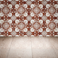 Image showing Wood table top and blur vintage ceramic tile pattern wall