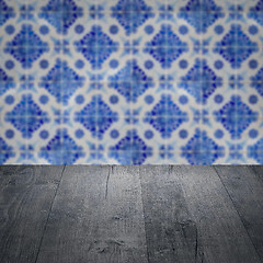 Image showing Wood table top and blur vintage ceramic tile pattern wall