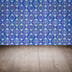 Image showing Wood table top and blur vintage ceramic tile pattern wall