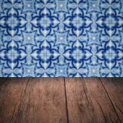 Image showing Wood table top and blur vintage ceramic tile pattern wall