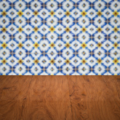 Image showing Wood table top and blur vintage ceramic tile pattern wall