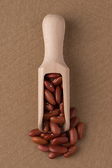 Image showing Wooden scoop with red beans