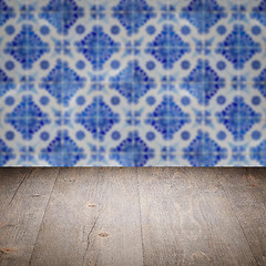 Image showing Wood table top and blur vintage ceramic tile pattern wall