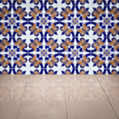 Image showing Wood table top and blur vintage ceramic tile pattern wall