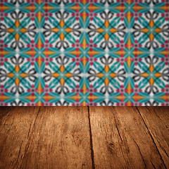 Image showing Wood table top and blur vintage ceramic tile pattern wall