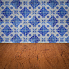 Image showing Wood table top and blur vintage ceramic tile pattern wall