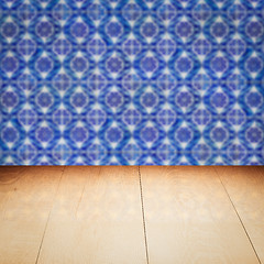 Image showing Wood table top and blur vintage ceramic tile pattern wall