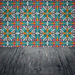 Image showing Wood table top and blur vintage ceramic tile pattern wall