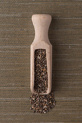 Image showing Wooden scoop with chia seeds