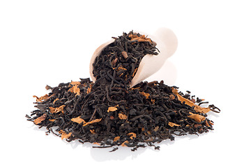 Image showing Black Dry Tea with a Wooden Spoon