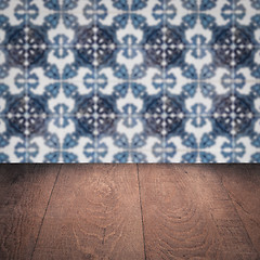 Image showing Wood table top and blur vintage ceramic tile pattern wall