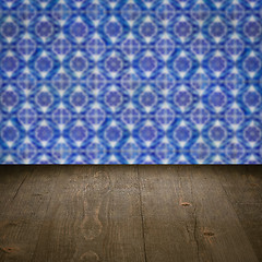 Image showing Wood table top and blur vintage ceramic tile pattern wall